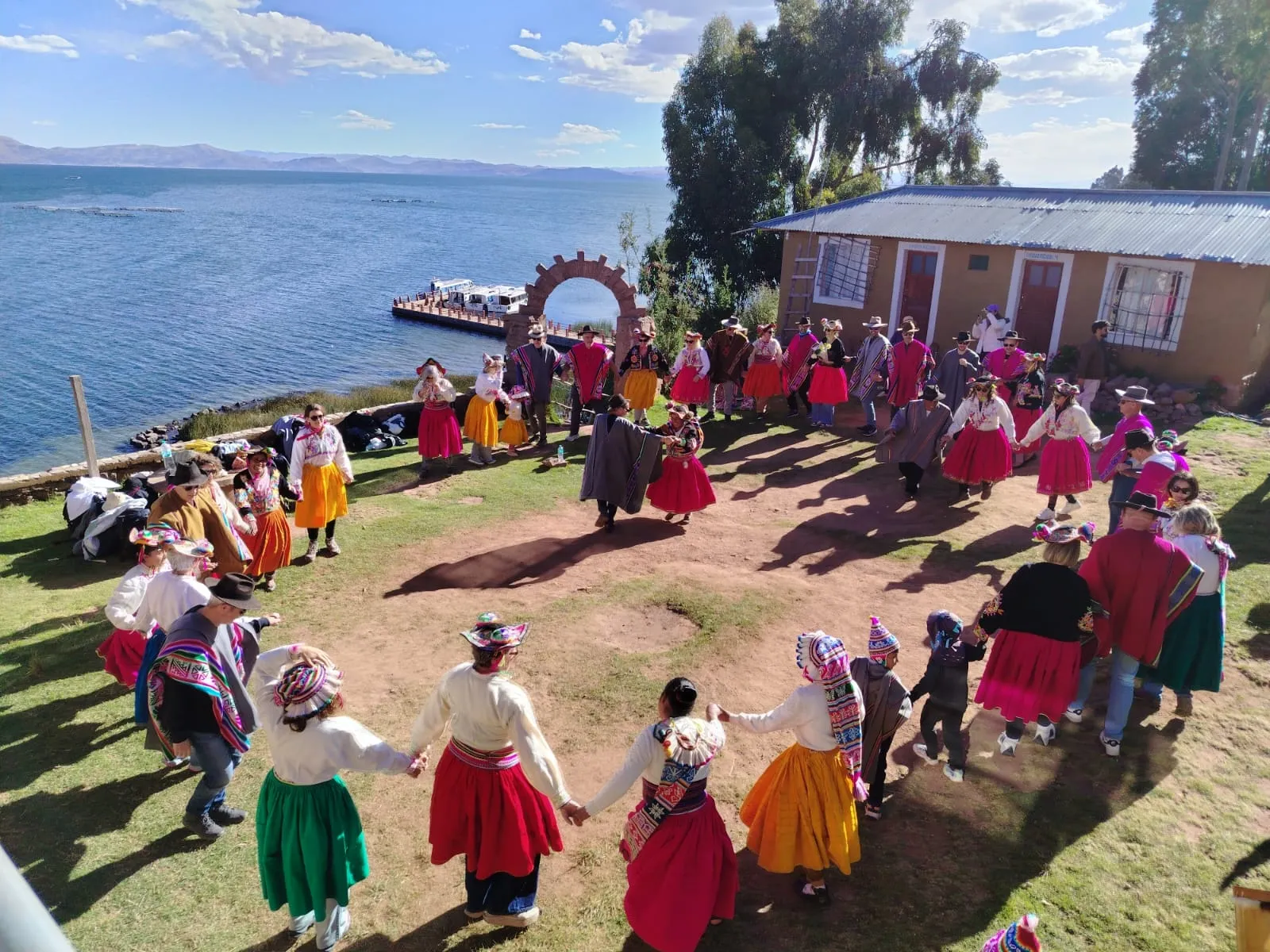 Traditional dance with the host community on Amantani Island, Lake Titicaca Traditional dance with the host community on Amantani Island, Lake Titicaca