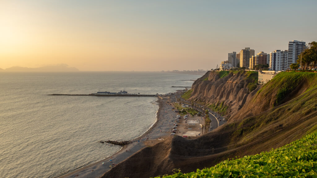 Beautiful shot of a sunset at the Mirador of Lima City in the area of Miraflores Lima layover: Miraflores cliffs above the Pacific at sunset