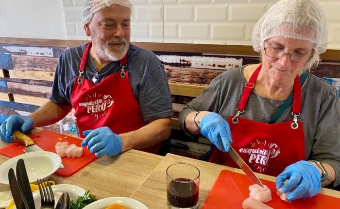 Lima cooking class: travelers cooking with the chef