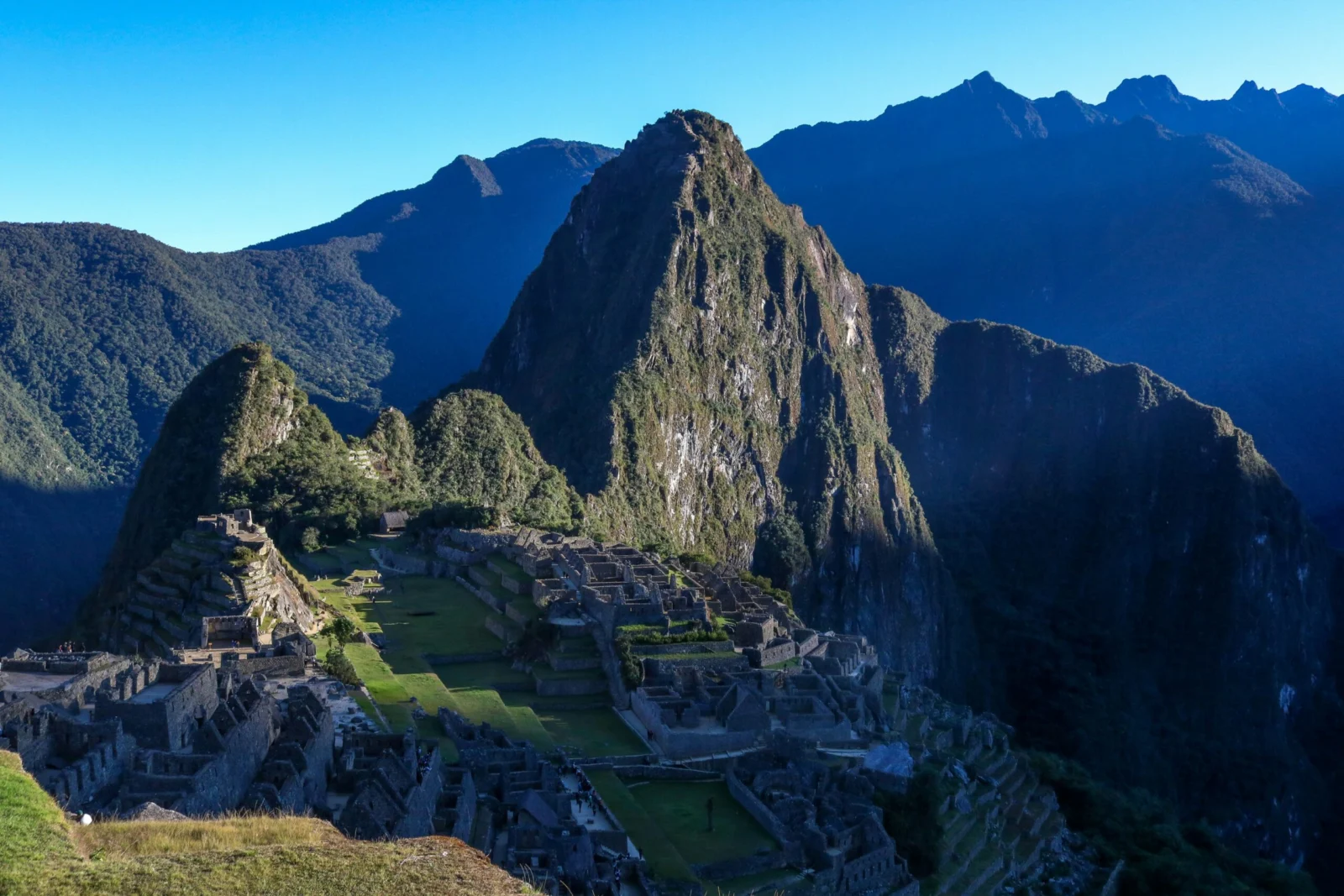 Machu Picchu citadel and Huayna Picchu in the morning sun