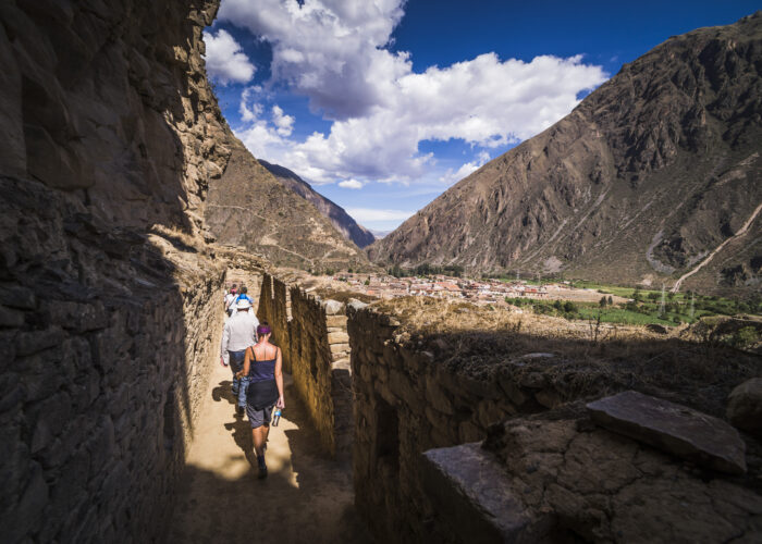 Tourists exploring Inca Ruins of Ollantaytambo, Sacred Valley of the Incas (Urubamba Valley), near C