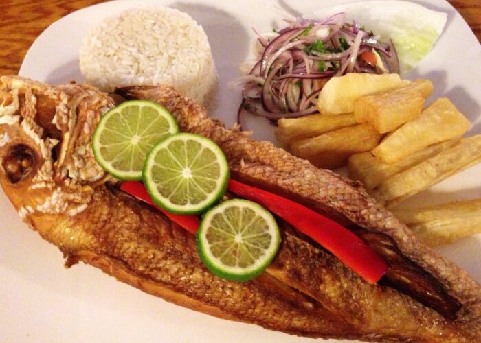 Trucha frita, Andean fried trout from Cusco Trucha frita served with rice and salad, a classic Andean dish from Cusco, Peru